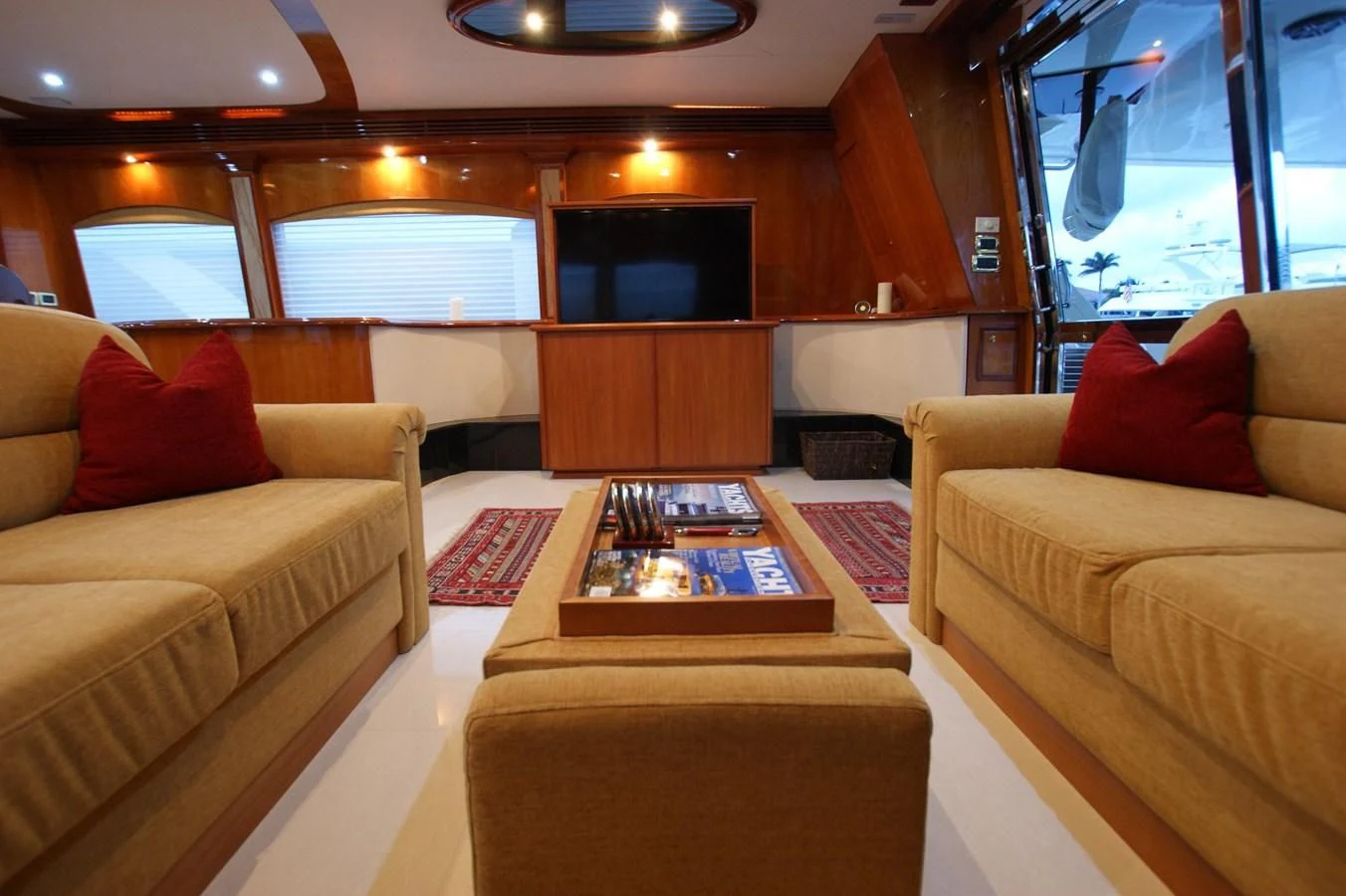 a living room with couches aboard LORI ANN Yacht for Sale