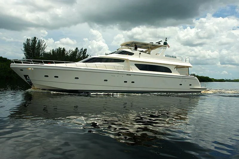 a white yacht on the water aboard LORI ANN Yacht for Sale