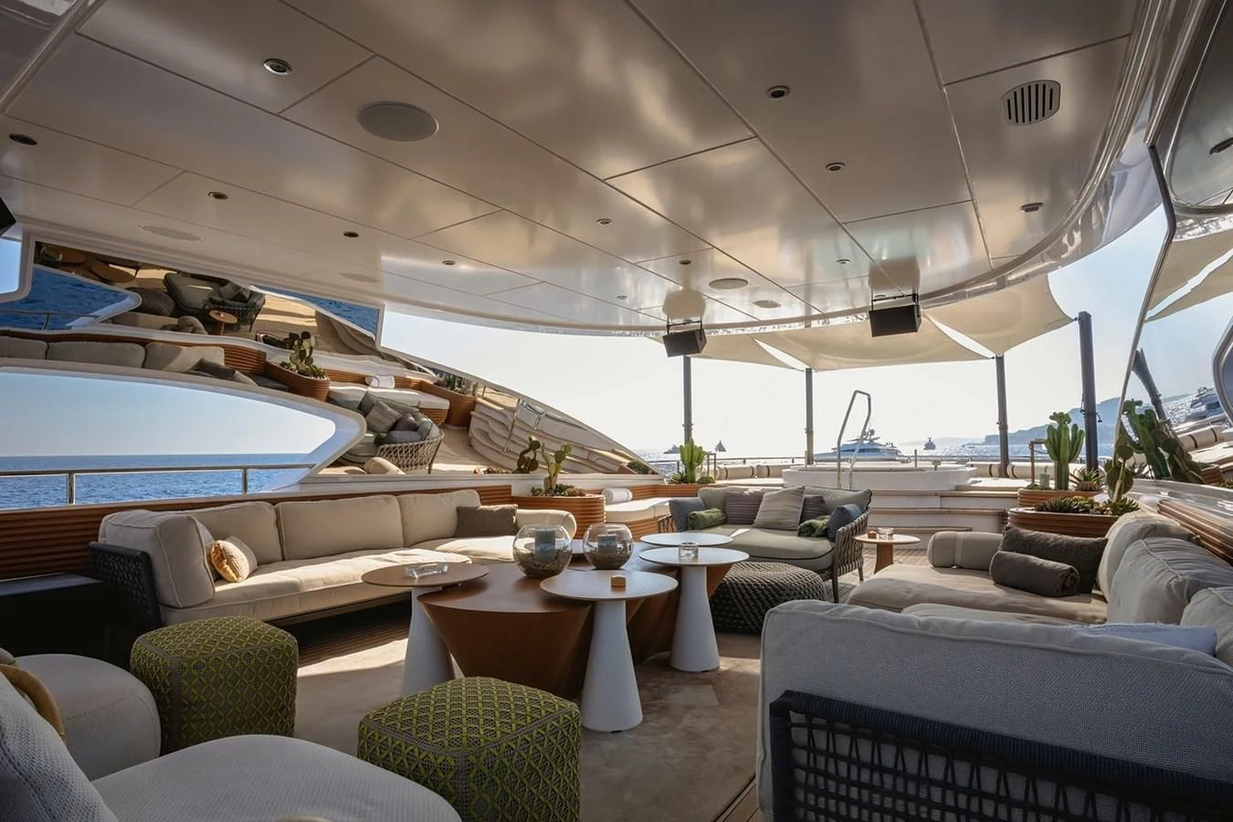 a room with a pool and couches aboard MY SECRET Yacht for Sale