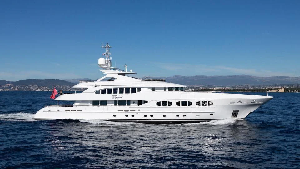 a large white boat in the water aboard MY SECRET Yacht for Sale