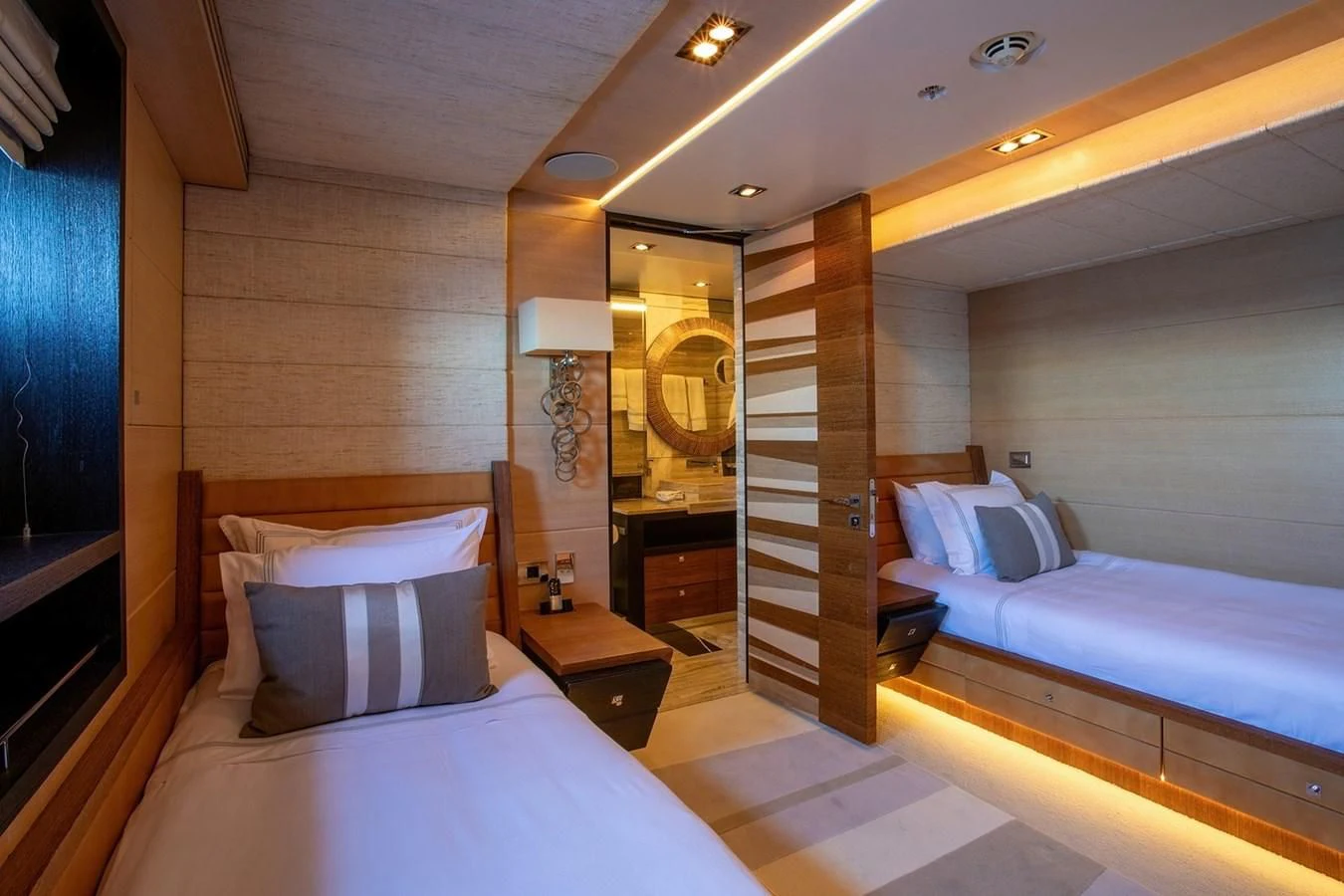 a room with a bed and a mirror aboard MY SECRET Yacht for Sale