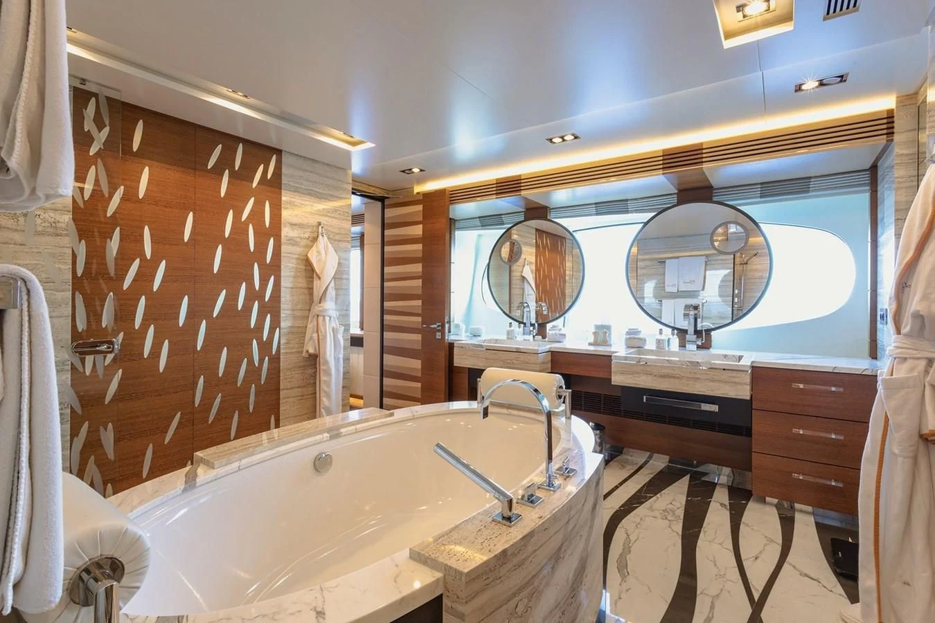 a bathroom with a tub sink and a mirror aboard MY SECRET Yacht for Sale