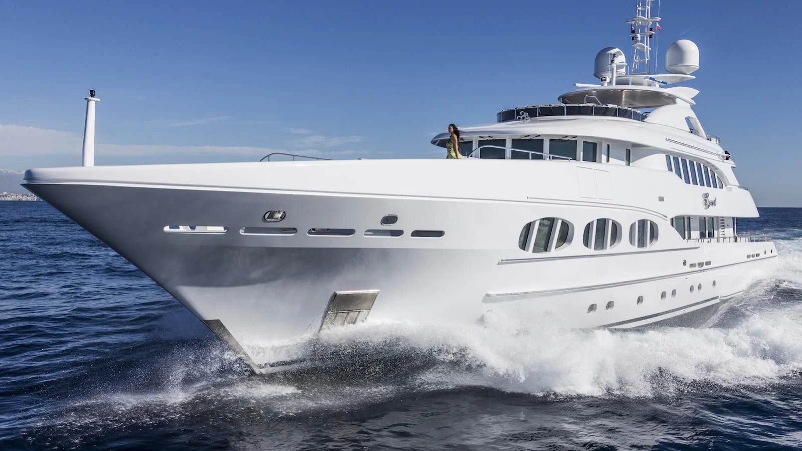 a white yacht on the water aboard MY SECRET Yacht for Sale