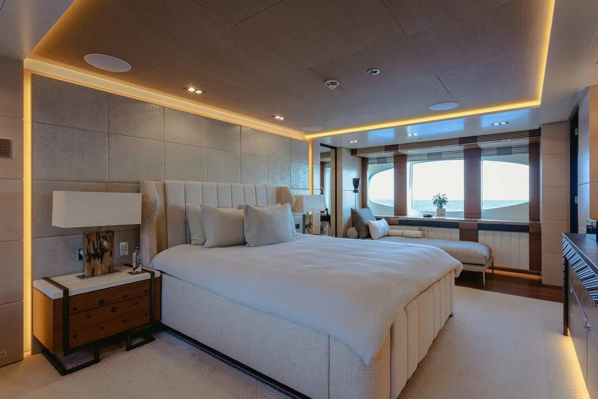 a room with a bed and a window aboard MY SECRET Yacht for Sale
