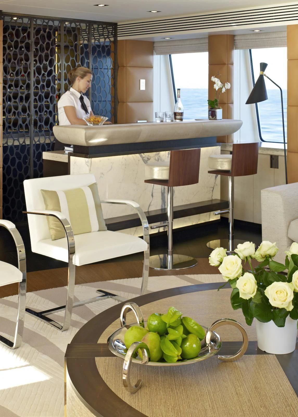 a person sitting at a table aboard MY SECRET Yacht for Sale