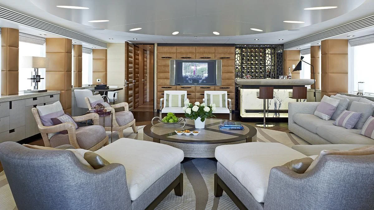 a living room with a large screen aboard MY SECRET Yacht for Sale