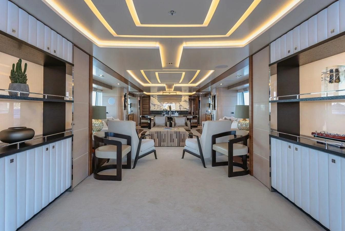 a large kitchen with white cabinets aboard MY SECRET Yacht for Sale