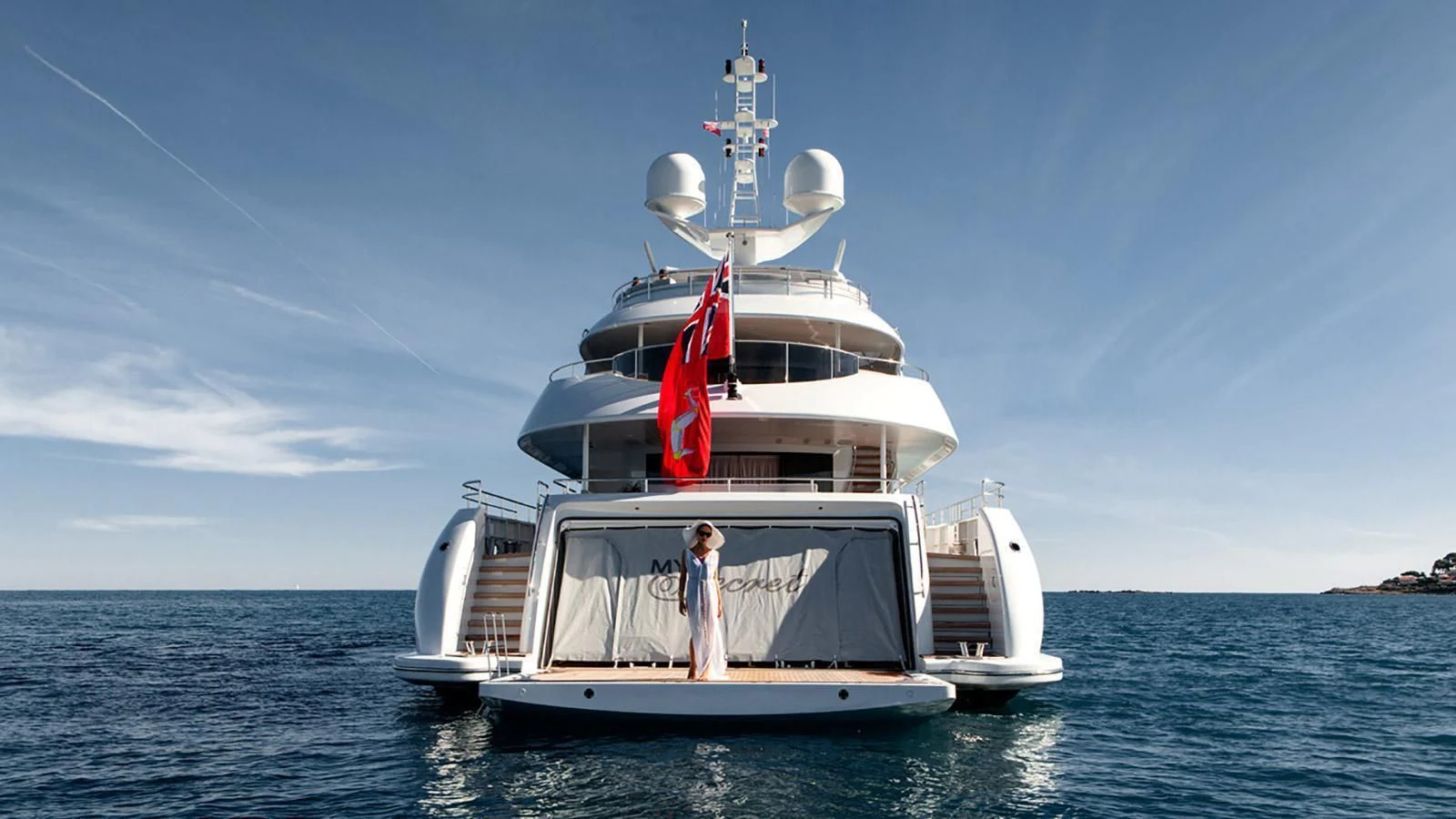 a person standing on a boat aboard MY SECRET Yacht for Sale