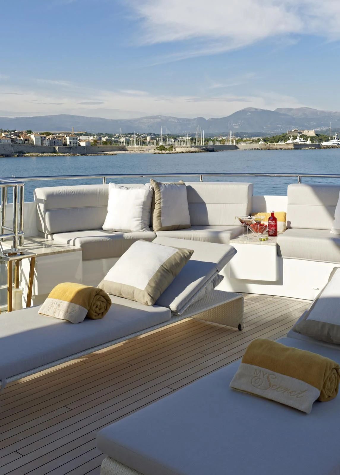 a room with a bed and pillows aboard MY SECRET Yacht for Sale