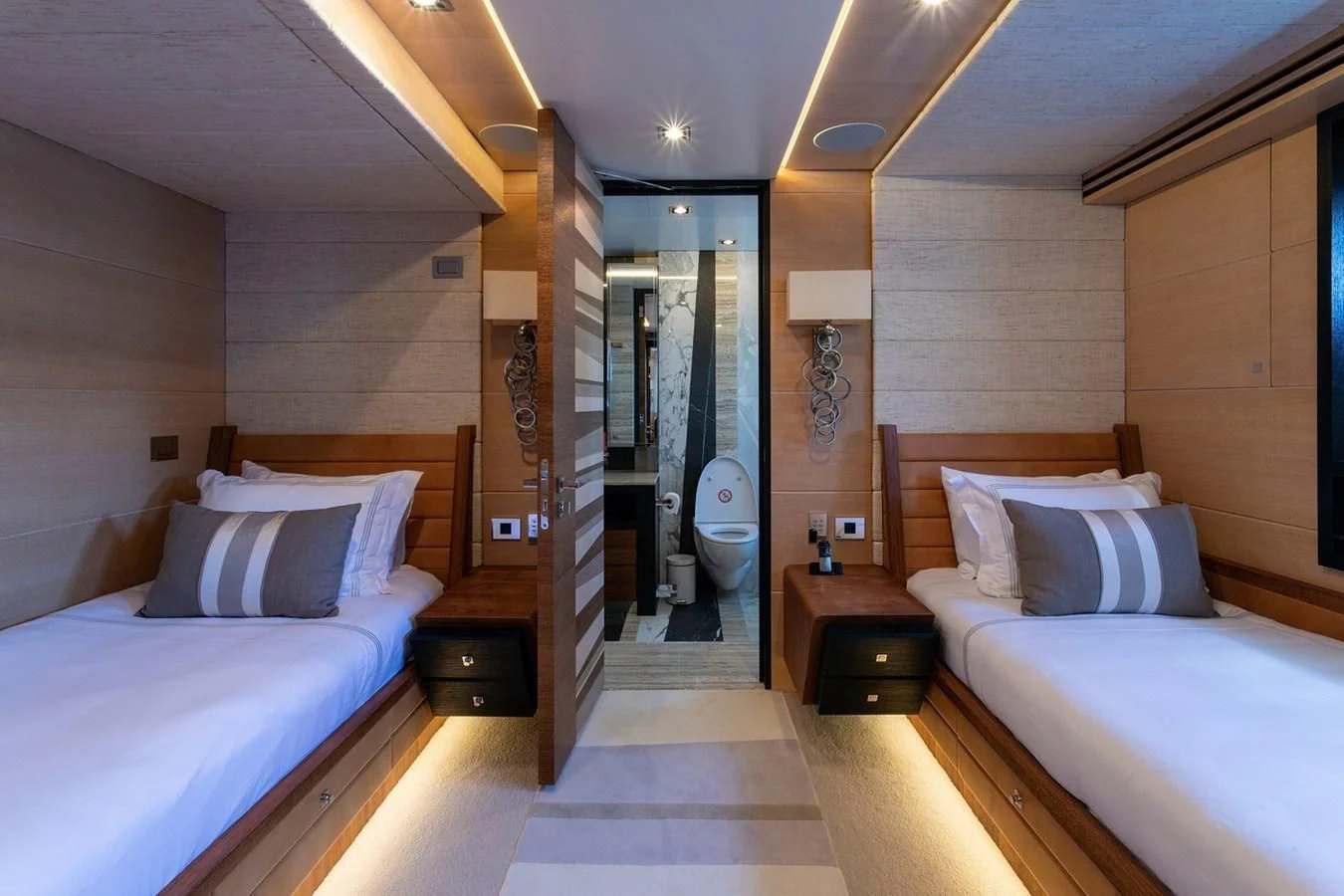 a room with a bed and a mirror aboard MY SECRET Yacht for Sale