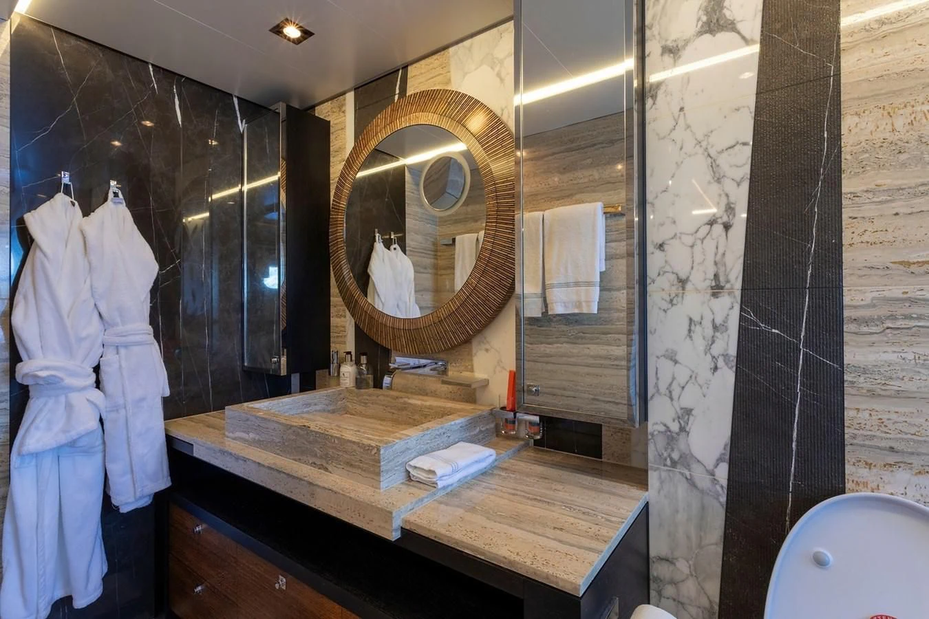 a bathroom with a large mirror aboard MY SECRET Yacht for Sale