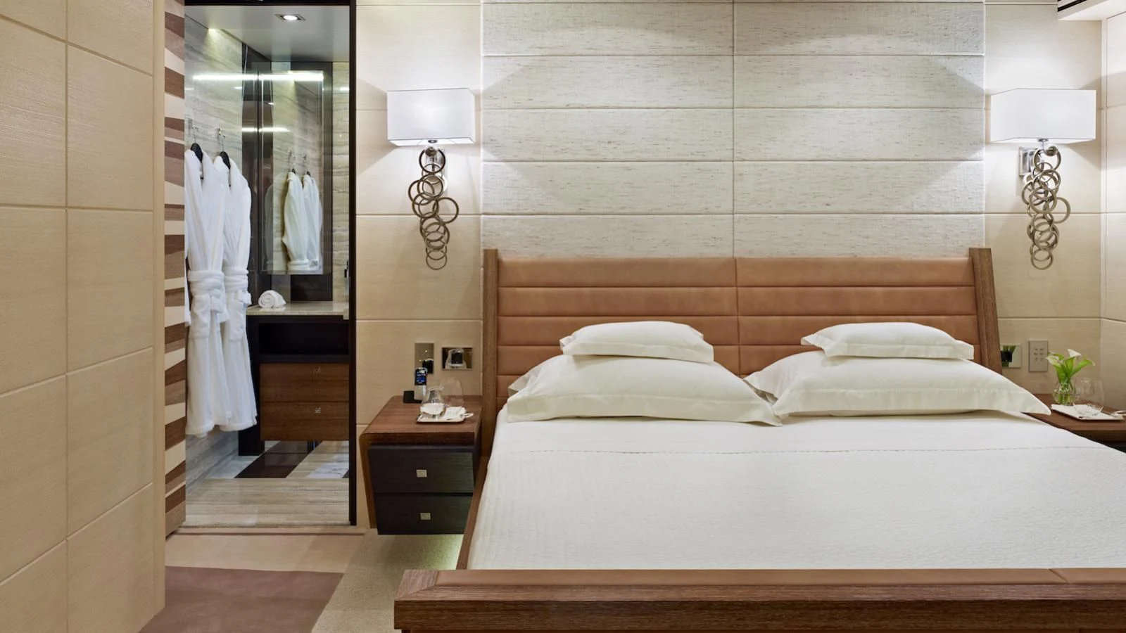 a room with a bed and a mirror aboard MY SECRET Yacht for Sale