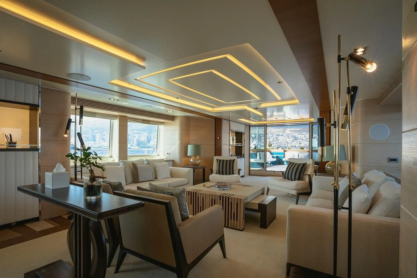 a living room with a table and chairs aboard MY SECRET Yacht for Sale