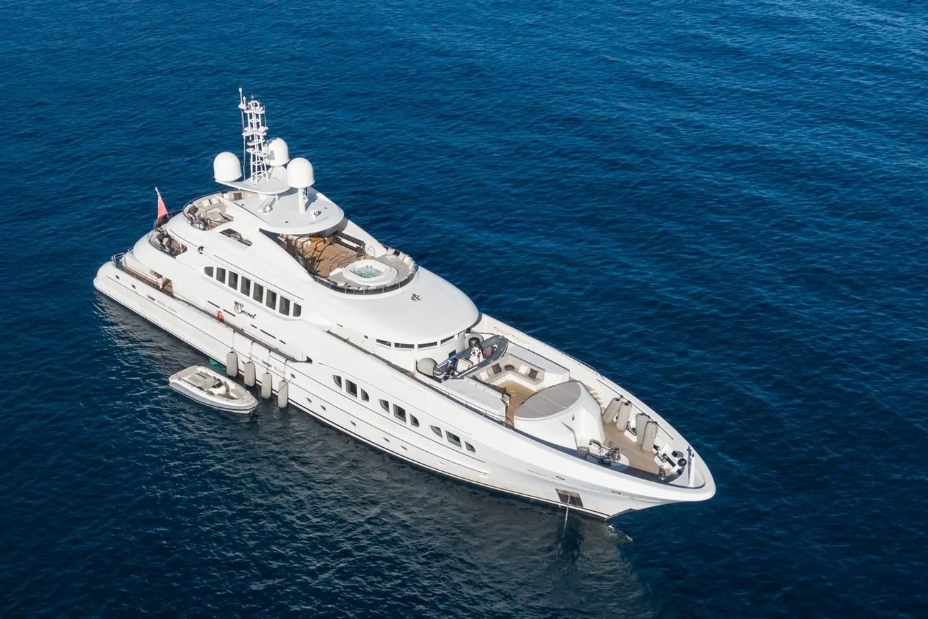 a large ship in the water aboard MY SECRET Yacht for Sale