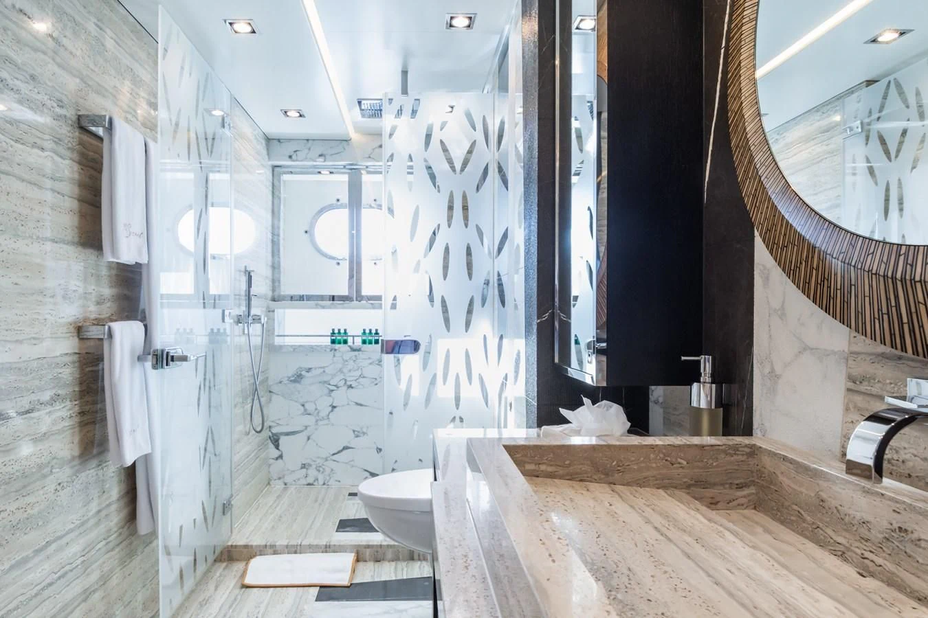 a bathroom with a large mirror aboard MY SECRET Yacht for Sale