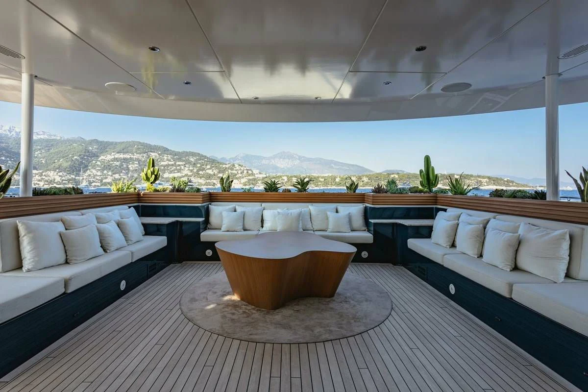 a large living room with a large balcony aboard MY SECRET Yacht for Sale