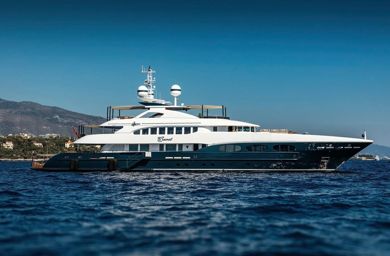 a large ship in the water aboard MY SECRET Yacht for Sale