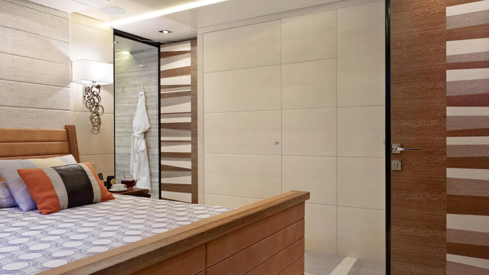 a bedroom with a bed and a mirror aboard MY SECRET Yacht for Sale