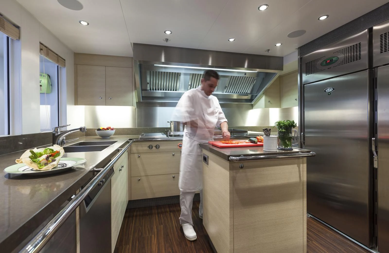 a chef in a kitchen aboard MY SECRET Yacht for Sale
