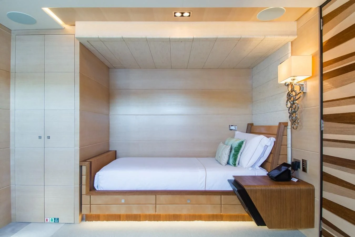a bed in a room aboard MY SECRET Yacht for Sale