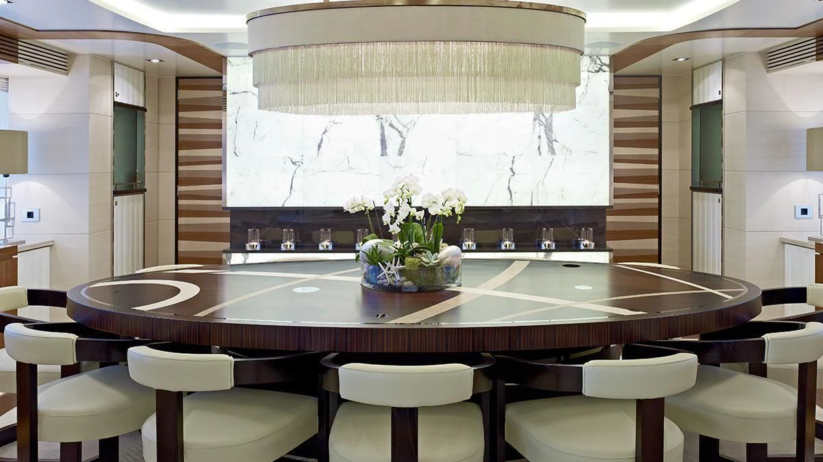a large kitchen with a large table aboard MY SECRET Yacht for Sale