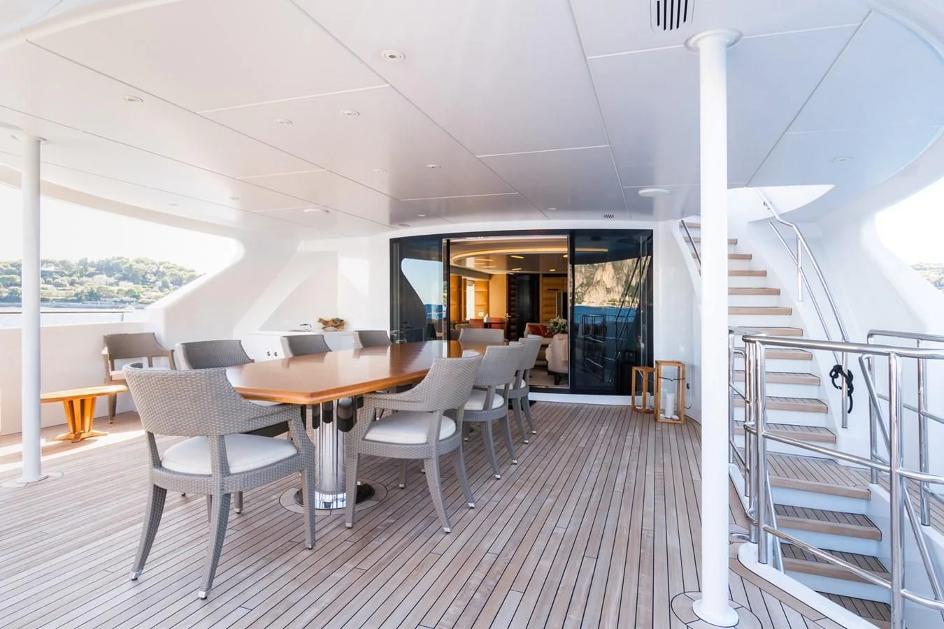a room with a table and chairs aboard MY SECRET Yacht for Sale