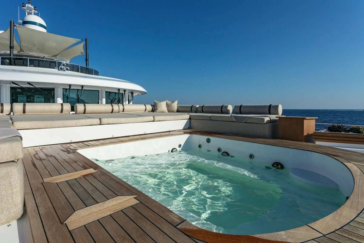 a swimming pool next to a boat aboard MY SECRET Yacht for Sale