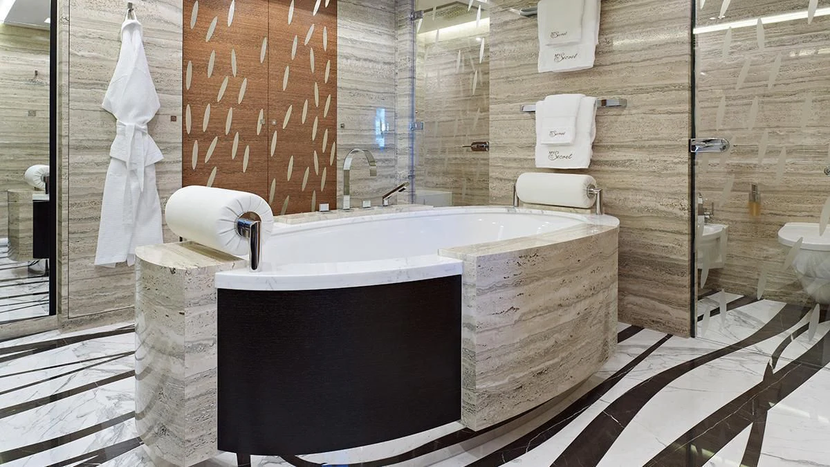 a bathroom with a tub and a sink aboard MY SECRET Yacht for Sale
