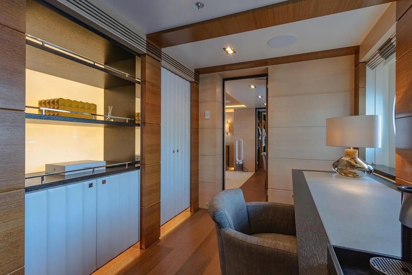 a room with a desk and a lamp aboard MY SECRET Yacht for Sale