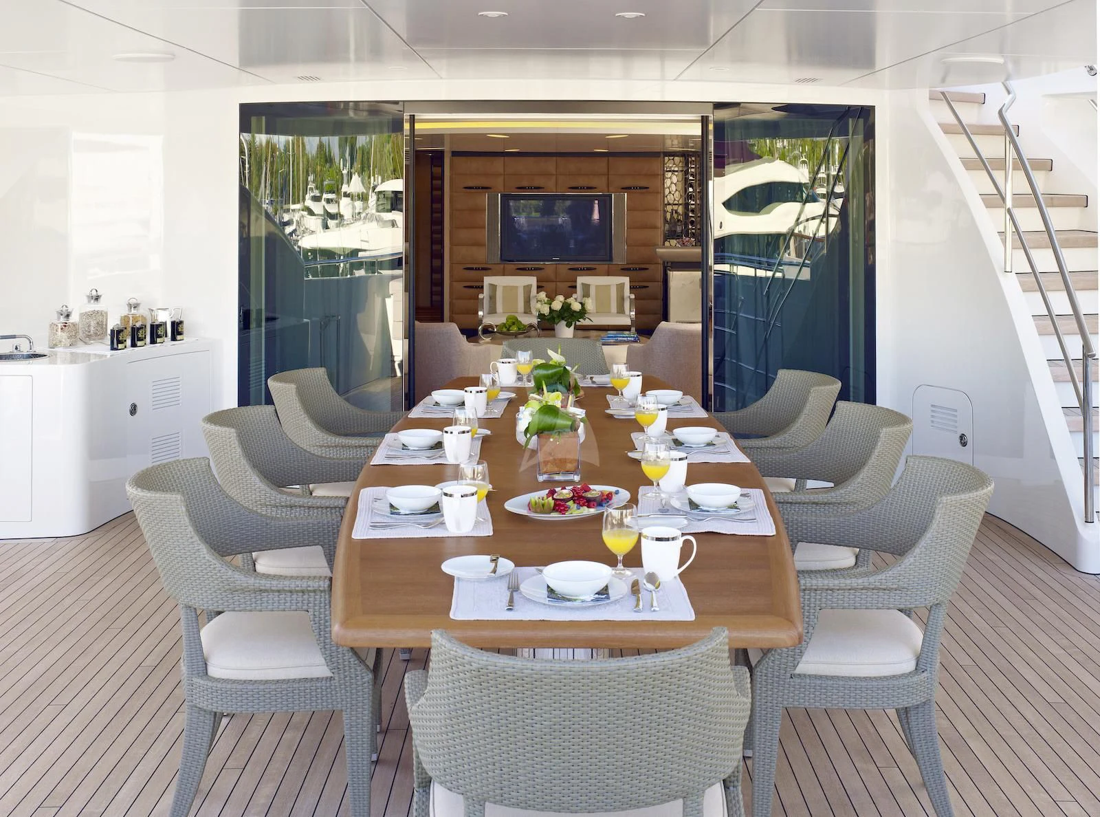 a dining room with a table and chairs aboard MY SECRET Yacht for Sale