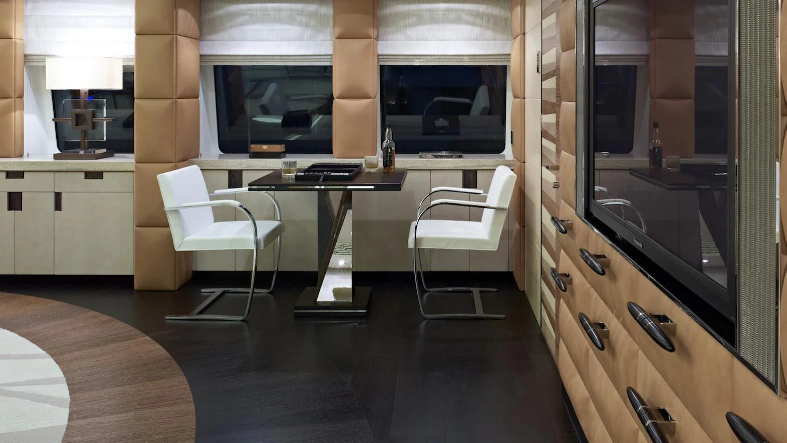 a room with a desk and chairs aboard MY SECRET Yacht for Sale