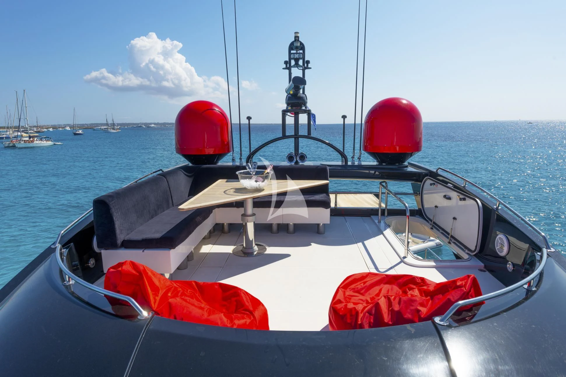 a boat with a red ball on the front aboard PALUMBA Yacht for Sale