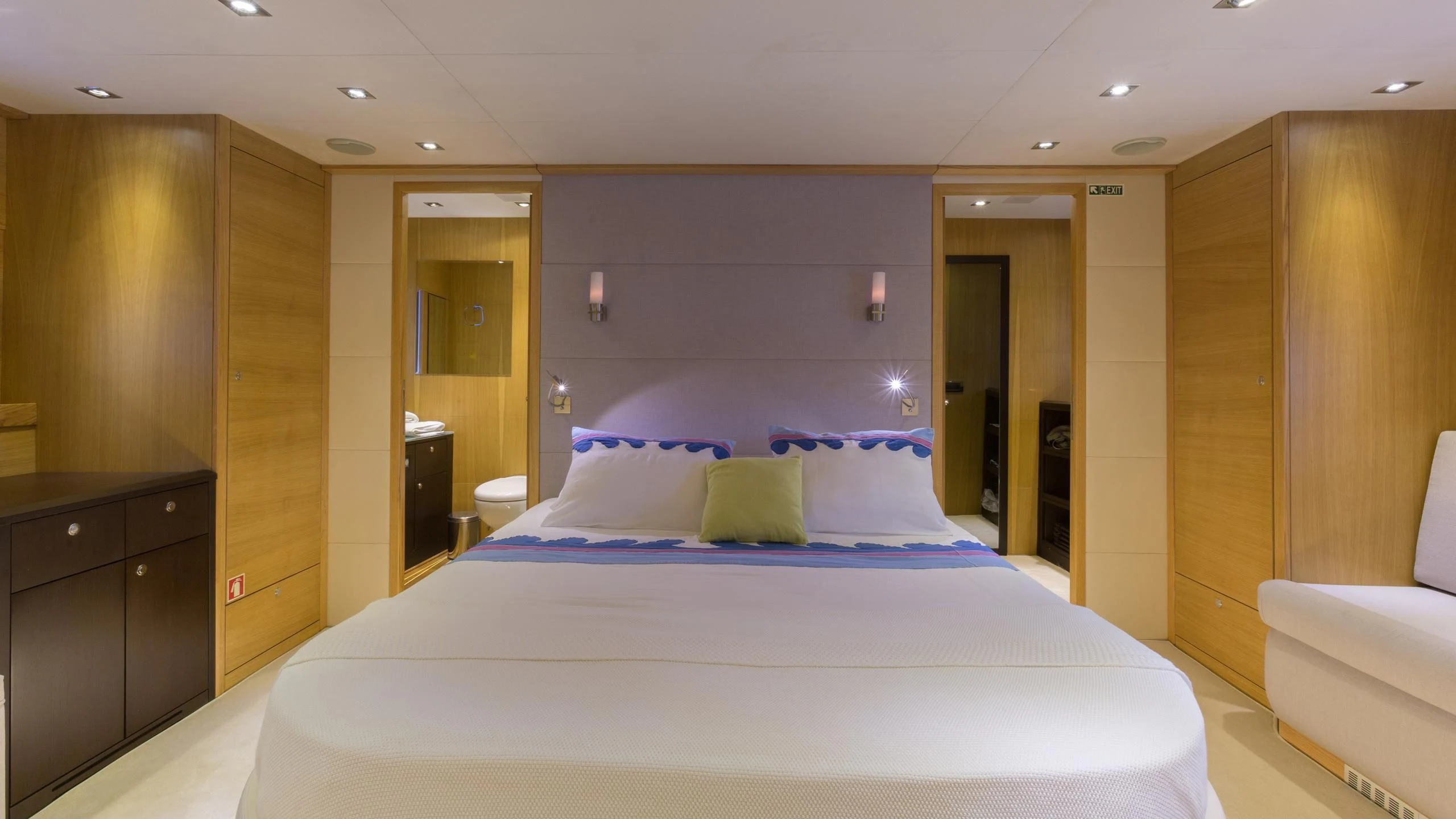 a large bed in a hotel room aboard GOOD VIBES Yacht for Sale