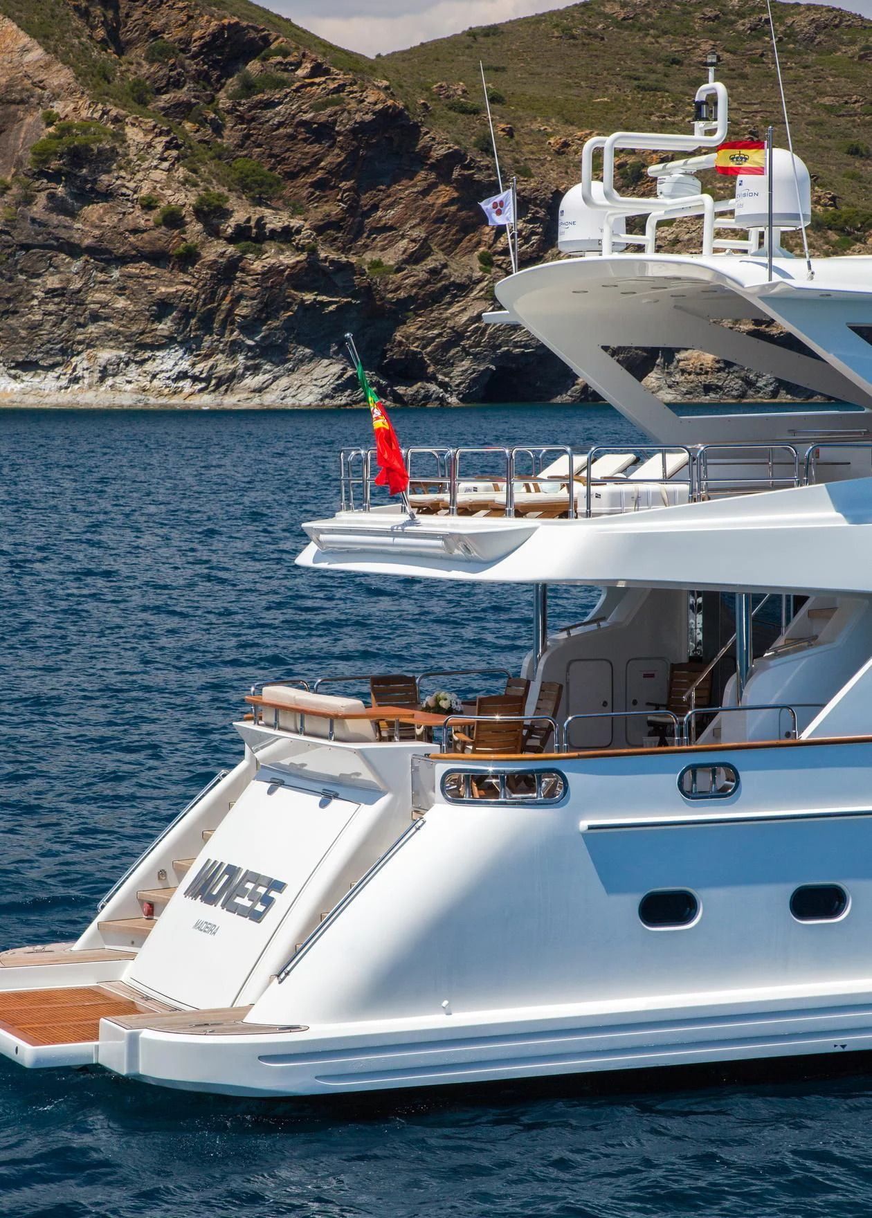 a couple of white boats on the water aboard GOOD VIBES Yacht for Sale