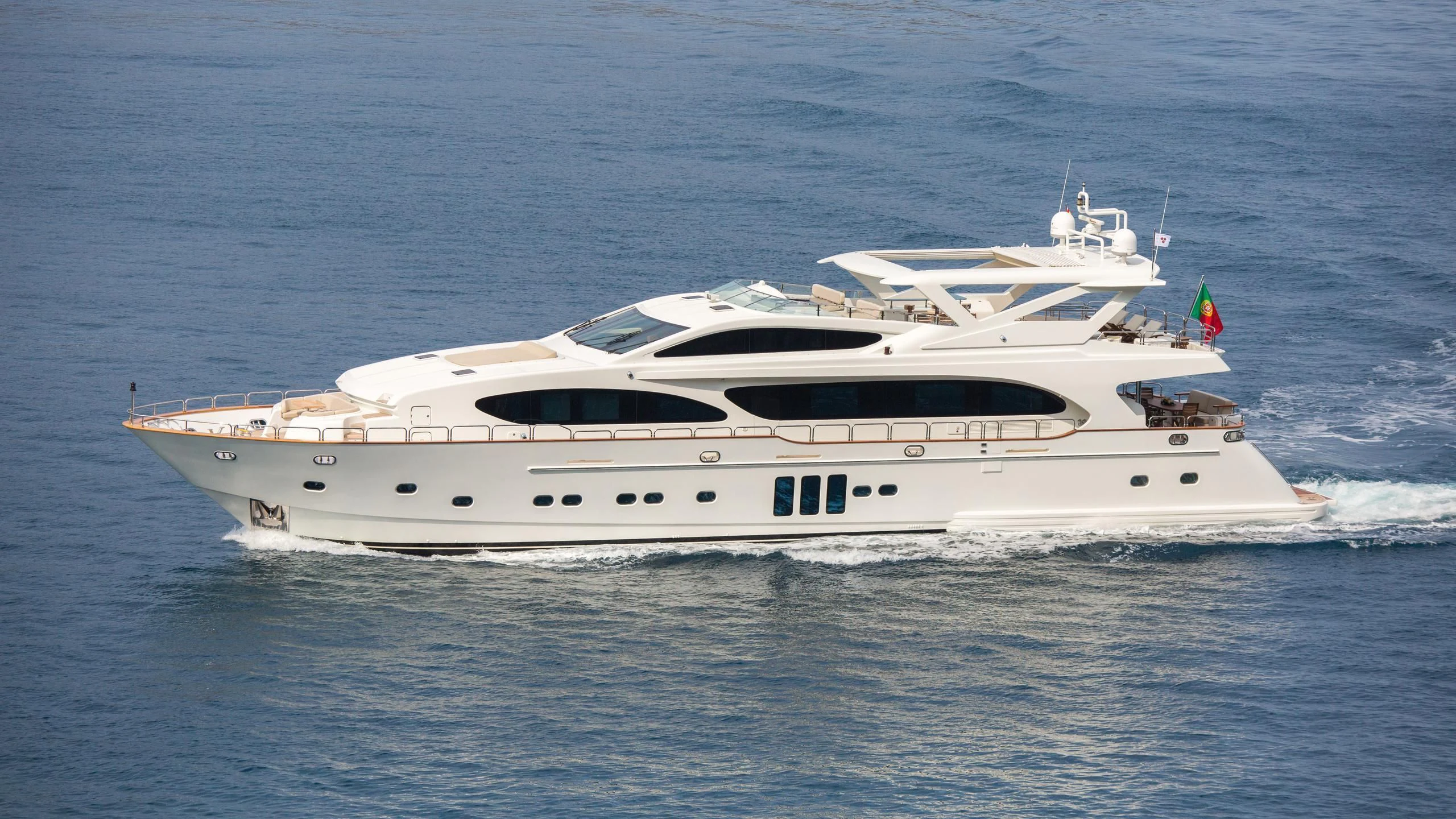 a white yacht in the water aboard GOOD VIBES Yacht for Sale
