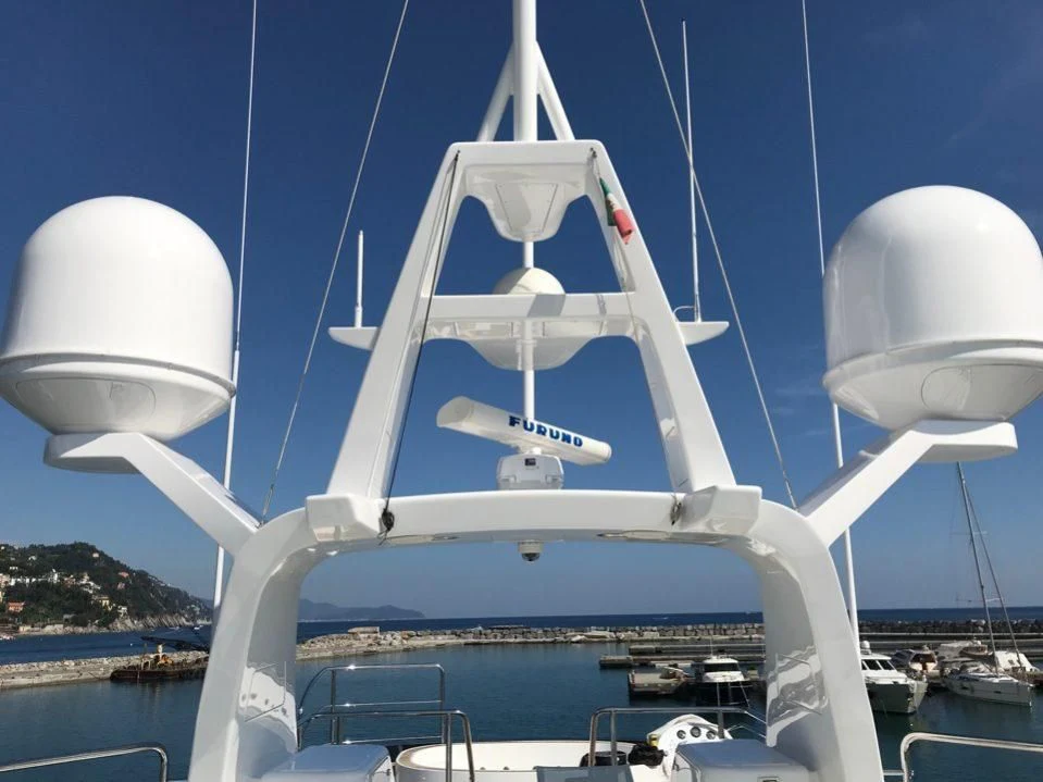 a white boat with a white round object on it aboard GOOD VIBES Yacht for Sale