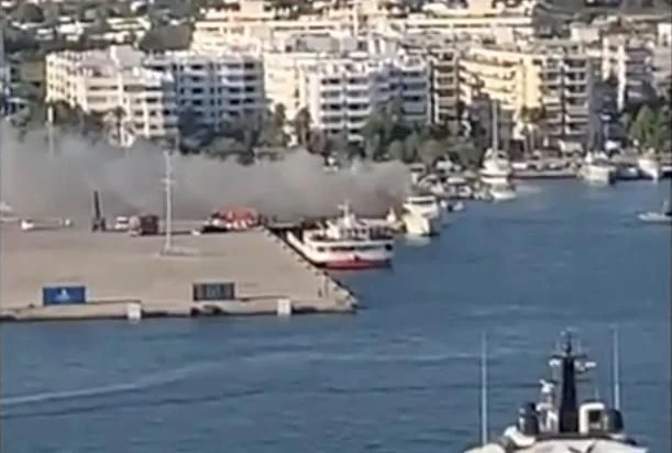 a beach with boats and buildings aboard GOOD VIBES Yacht for Sale