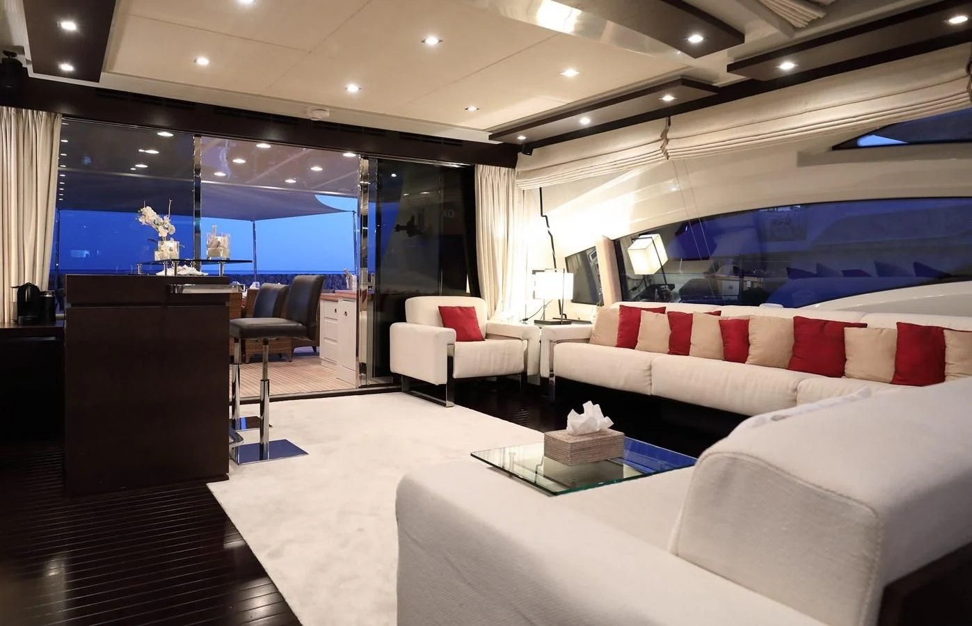 a room with a couch and a tv aboard PATRONESS Yacht for Sale
