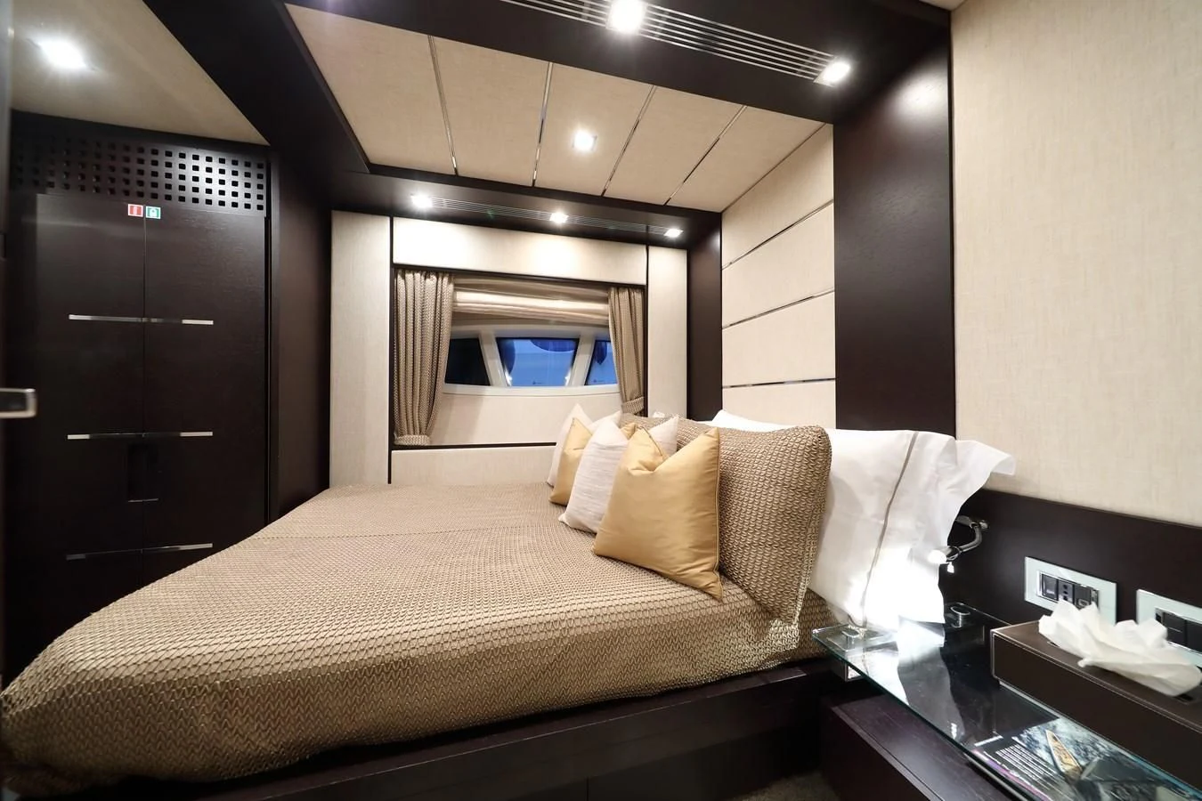 a bed in a hotel room aboard PATRONESS Yacht for Sale