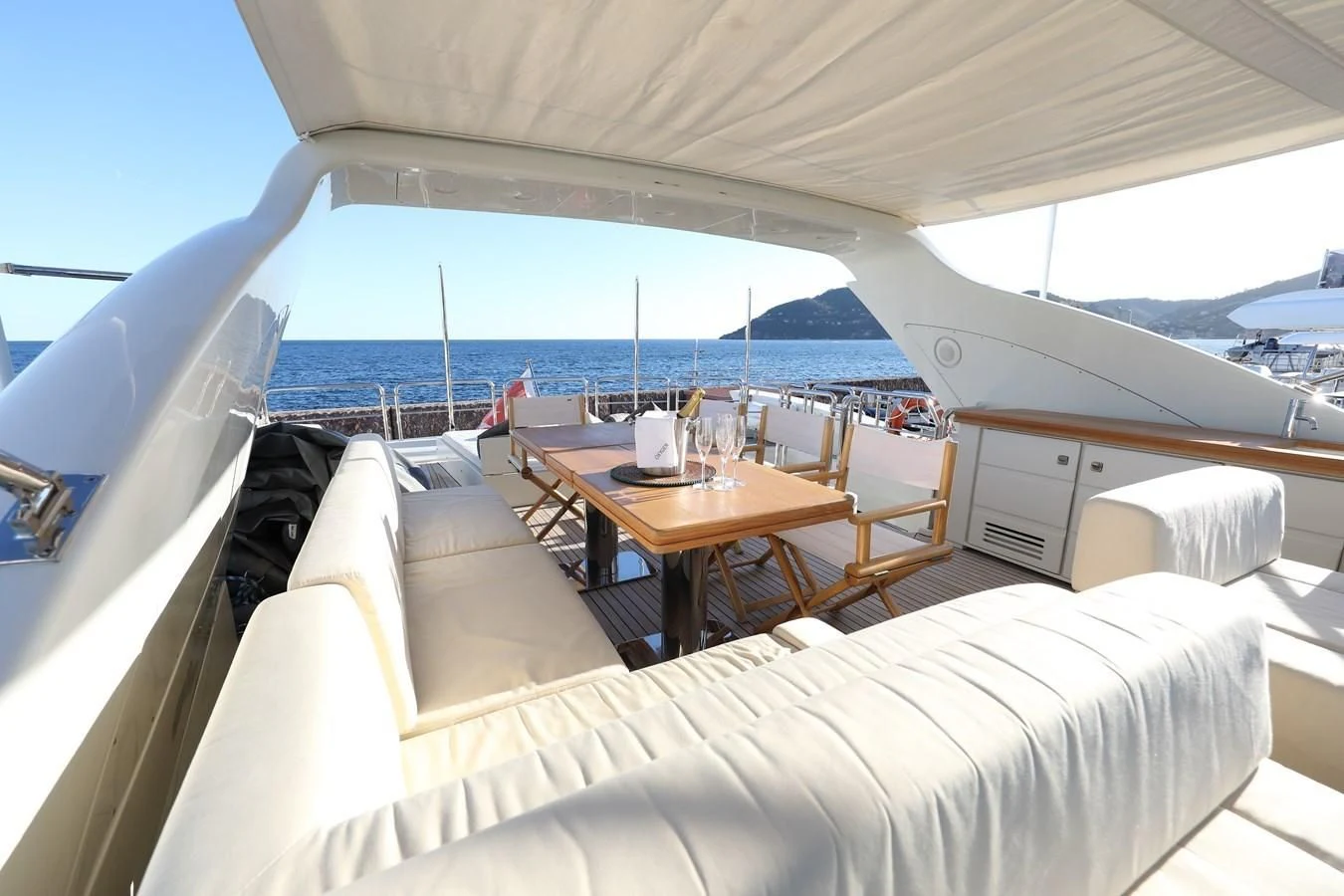 a table and chairs on a boat aboard PATRONESS Yacht for Sale