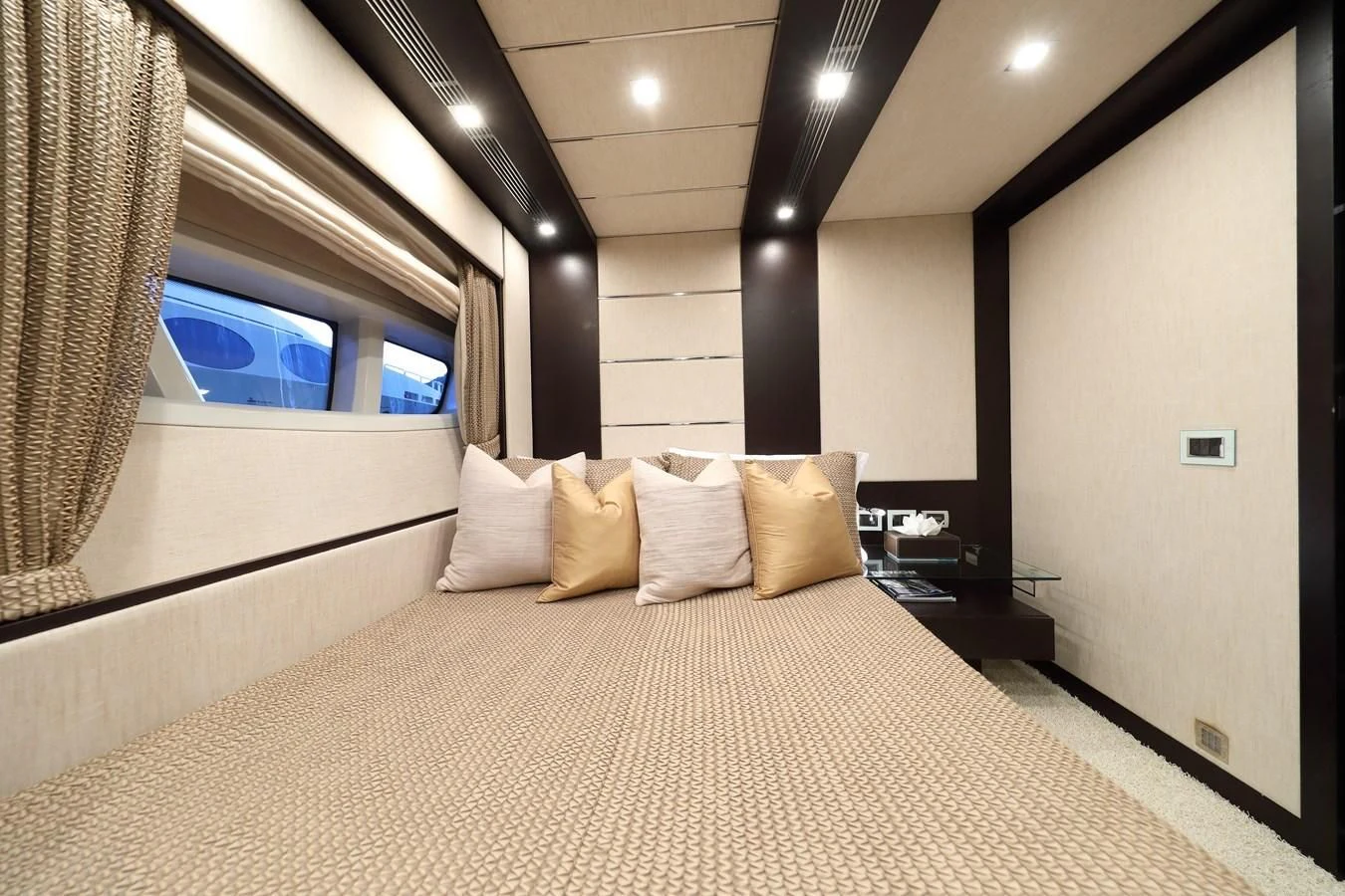 a bed with pillows aboard PATRONESS Yacht for Sale