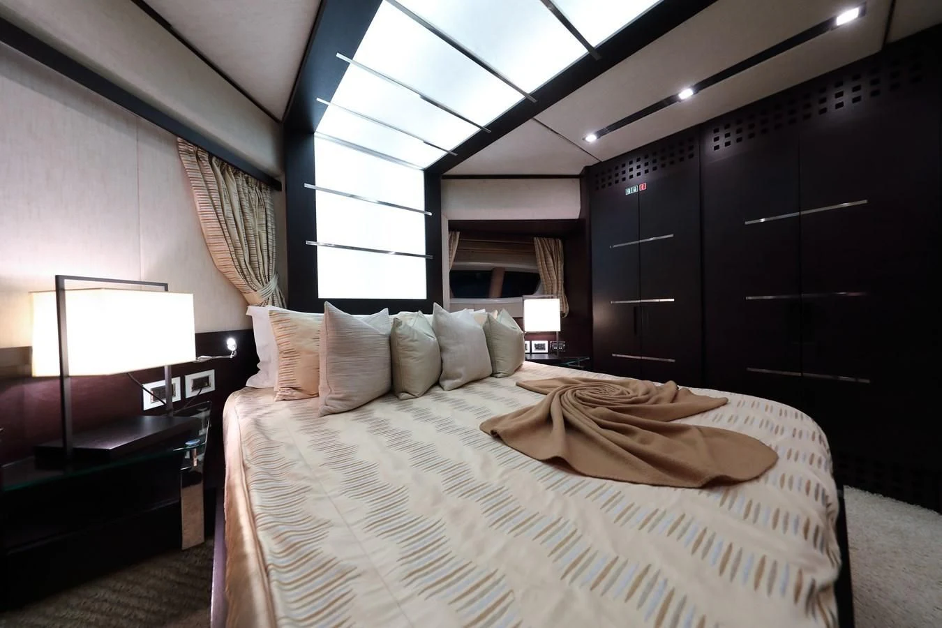 a bed in a room aboard PATRONESS Yacht for Sale