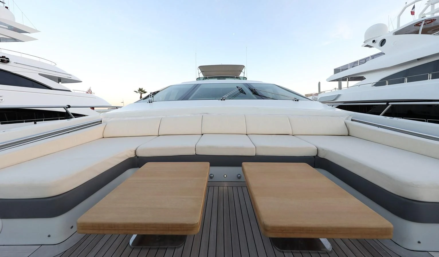 a boat with a wooden deck aboard PATRONESS Yacht for Sale