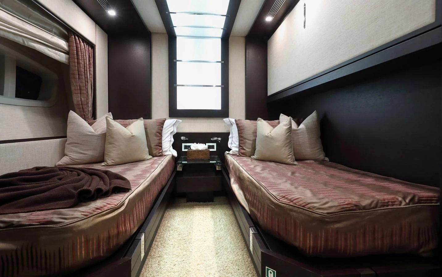 a room with two beds aboard PATRONESS Yacht for Sale