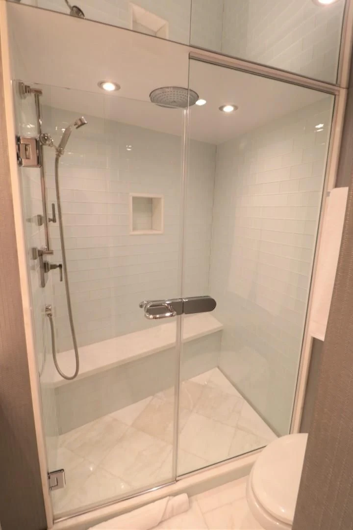 a shower with a glass door aboard LADY CARMEN Yacht for Sale