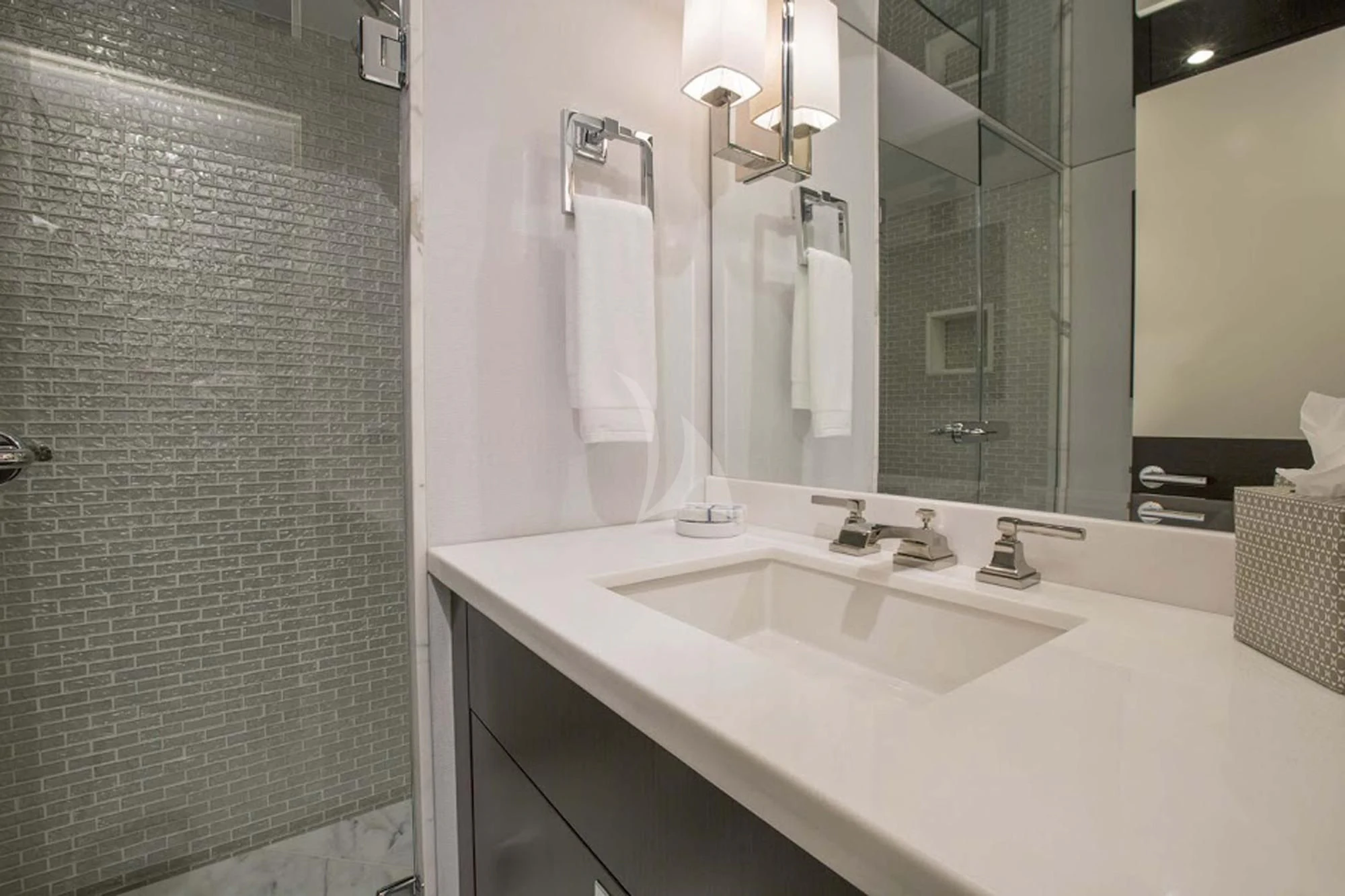 a bathroom with a sink and a mirror aboard LADY CARMEN Yacht for Sale