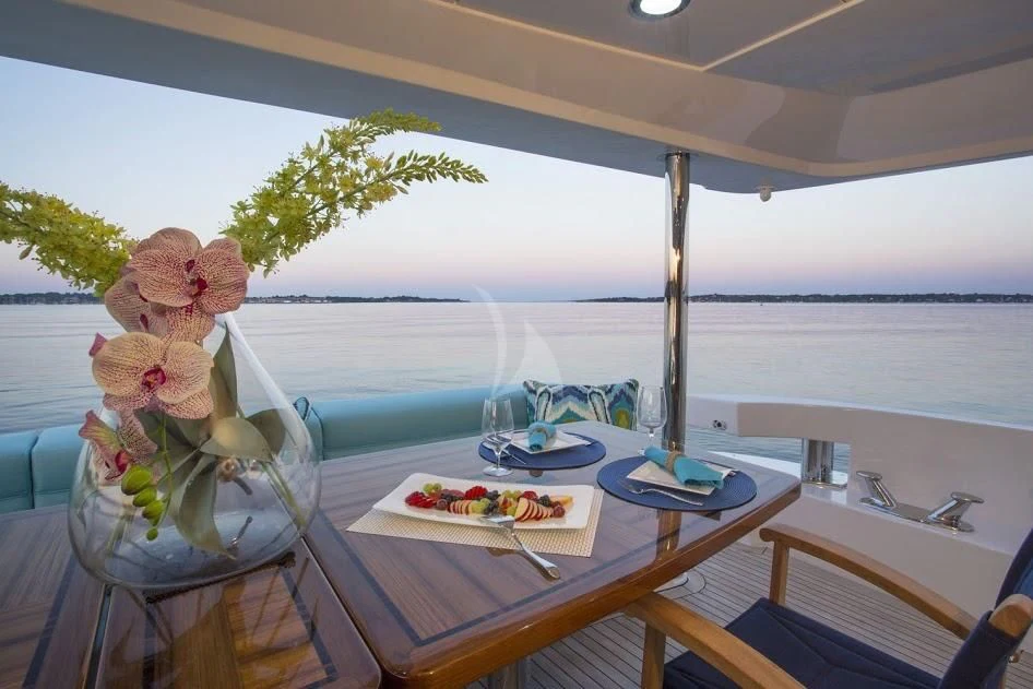 a table with food on it aboard LADY CARMEN Yacht for Sale