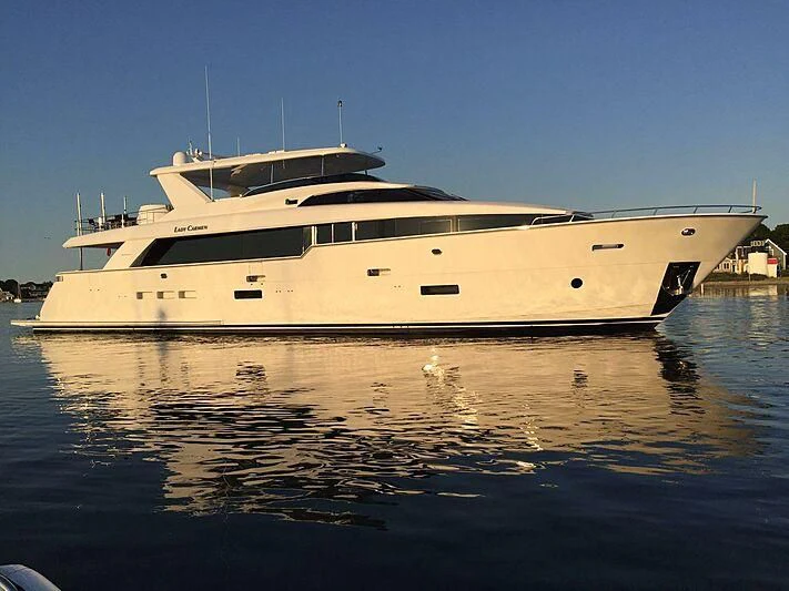 a white yacht on the water aboard LADY CARMEN Yacht for Sale