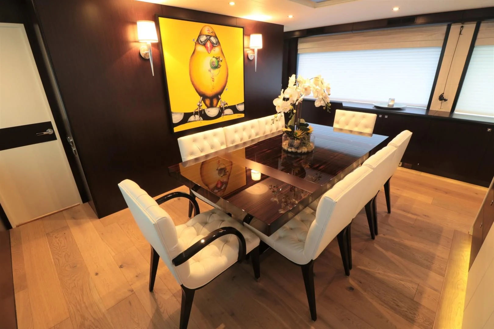 a dining table in a room aboard LADY CARMEN Yacht for Sale