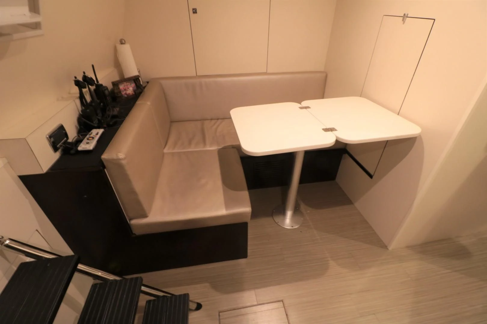 a couch and a table in a room aboard LADY CARMEN Yacht for Sale